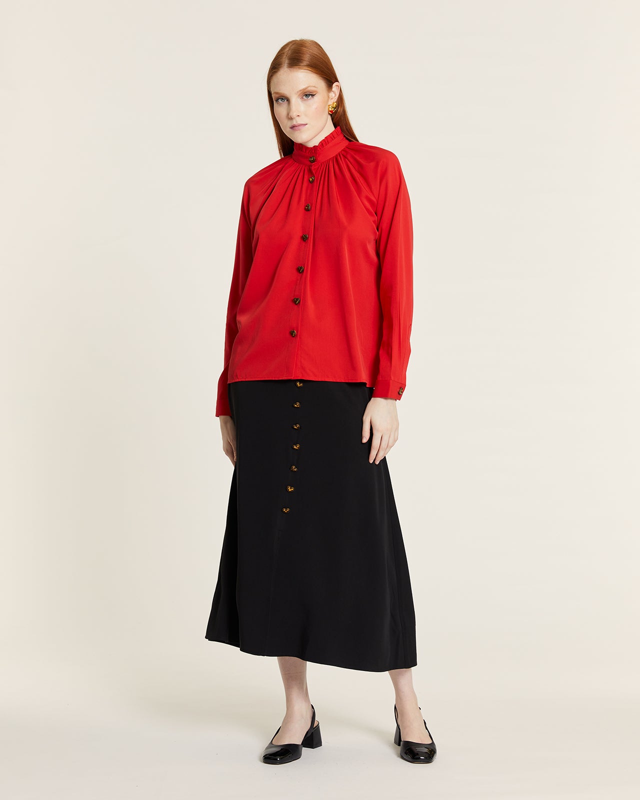 HIGH NECK BLOUSE WITH RED BUTTON