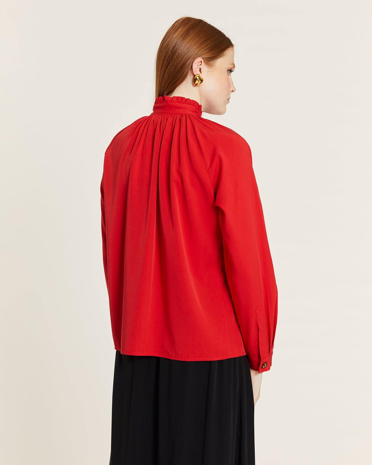 HIGH NECK BLOUSE WITH RED BUTTON
