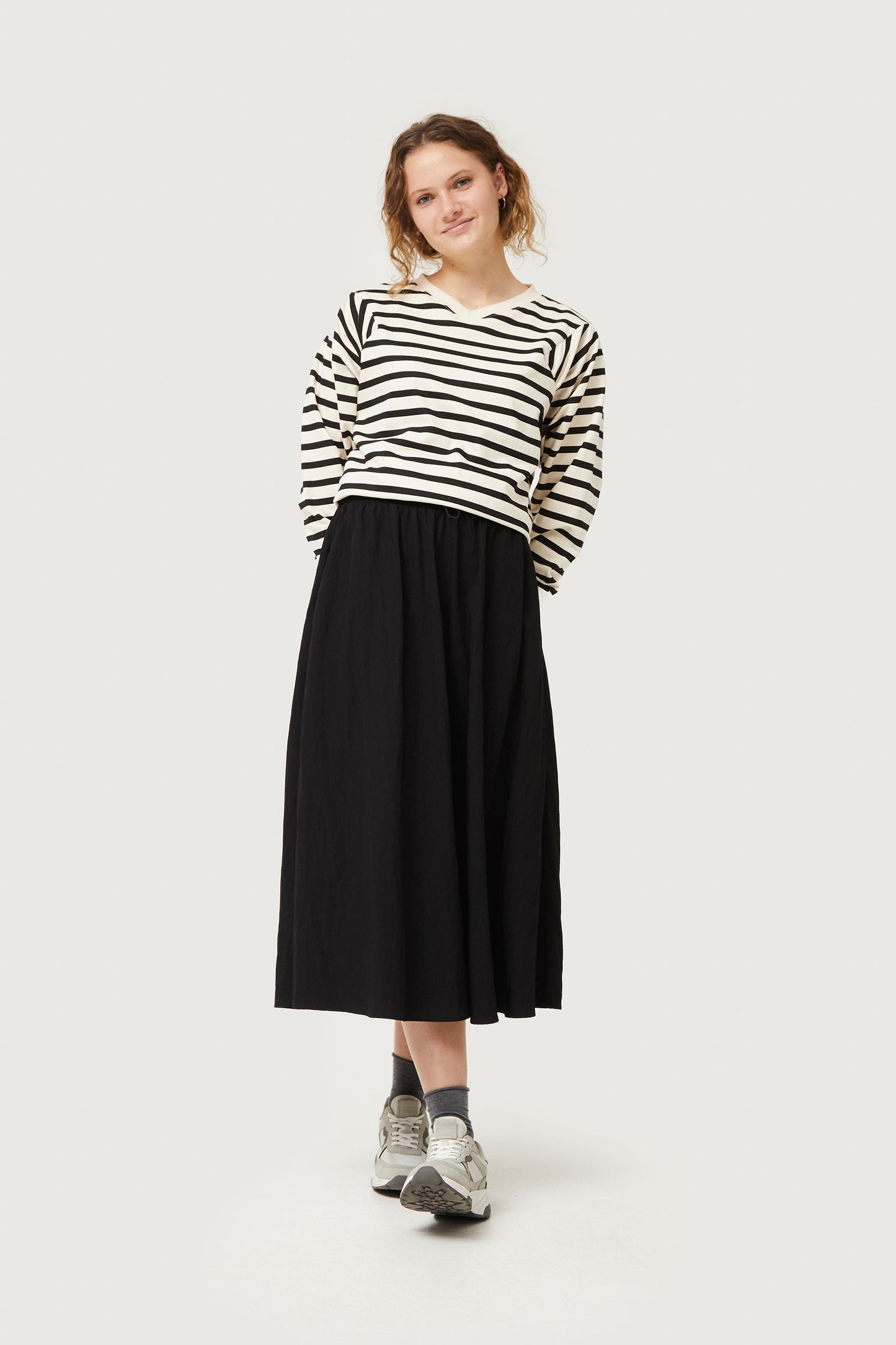 Midi skirt in black technical fabric
