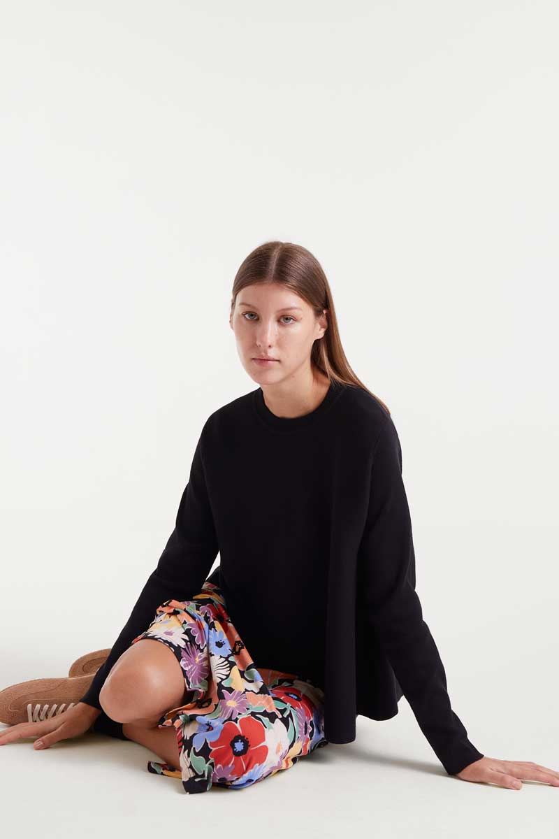 Black flared knit sweater