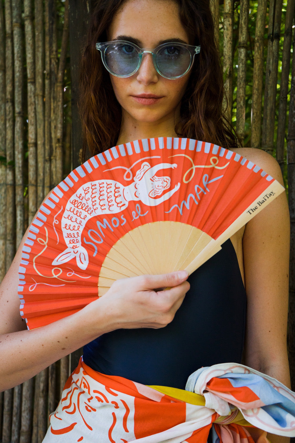 Coral hand fan