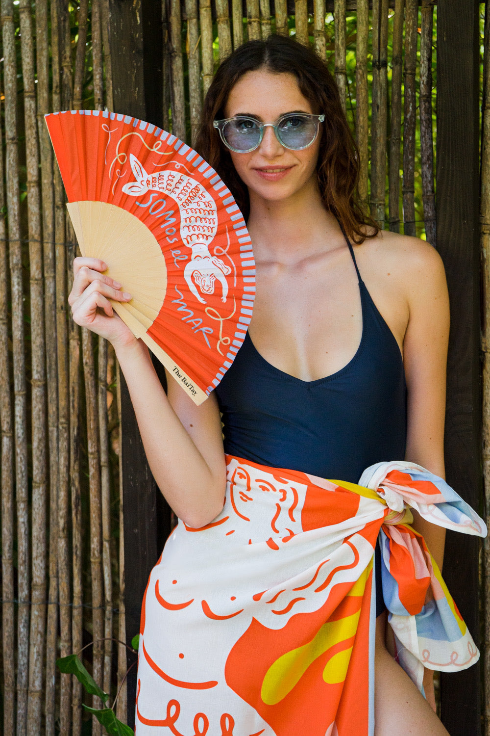Coral hand fan