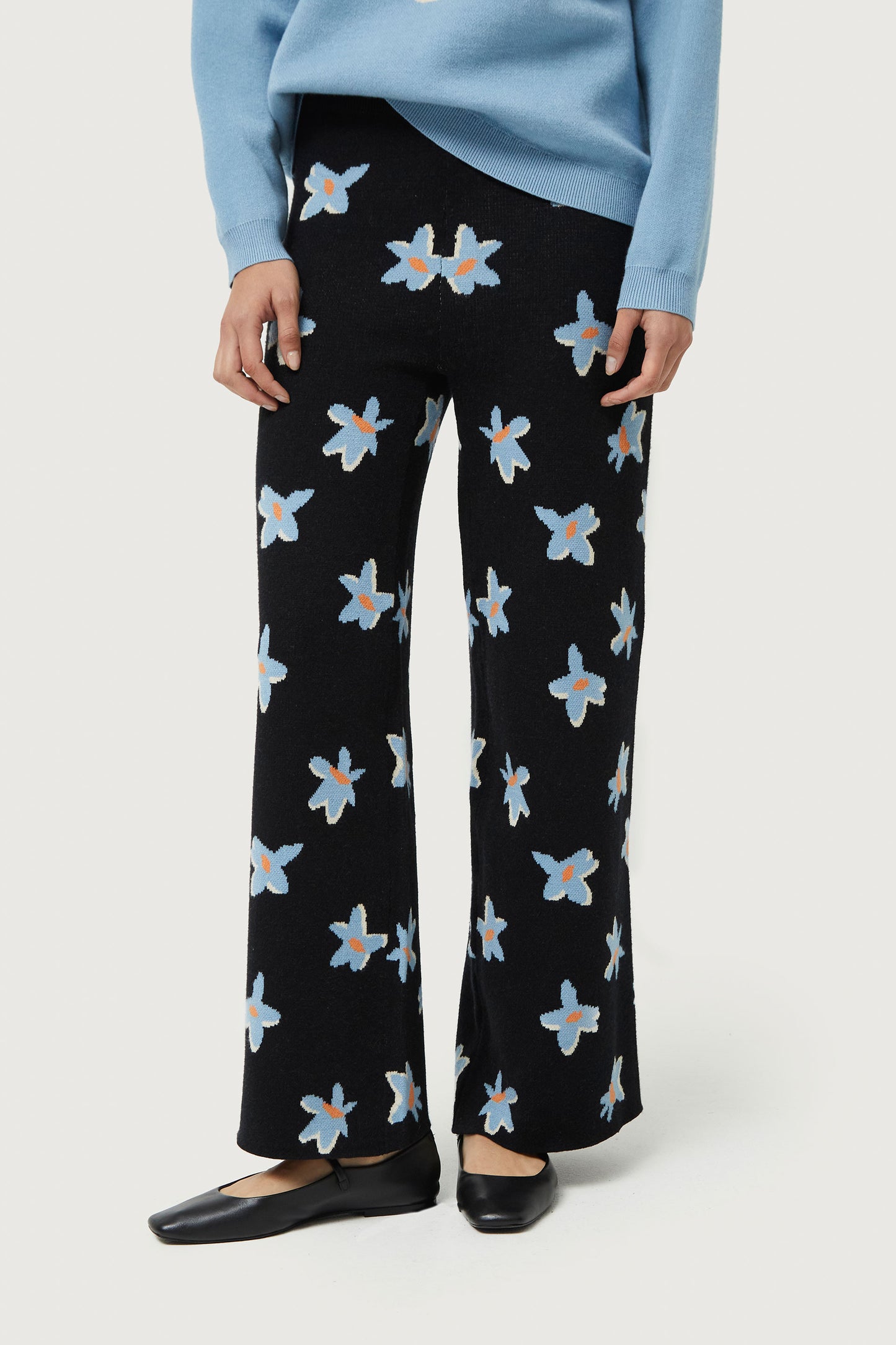 Black Calatea floral print jacquard knit pants
