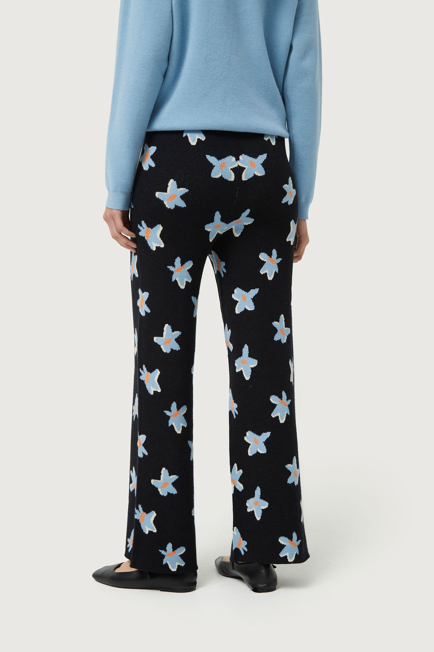 Black Calatea floral print jacquard knit pants