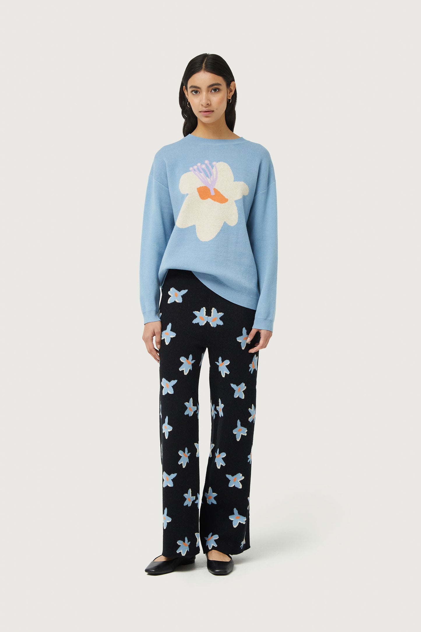 Black Calatea floral print jacquard knit pants