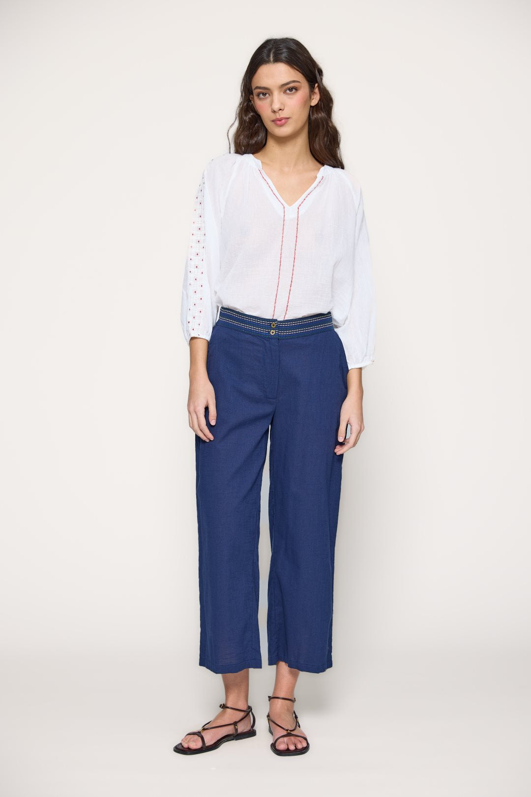 Wide trousers with topstitching