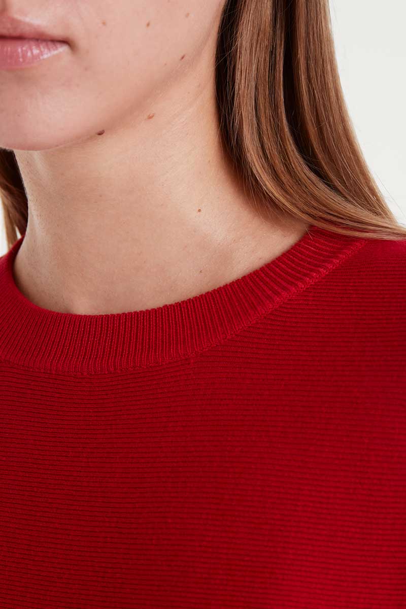 Red packaged knitted sweater