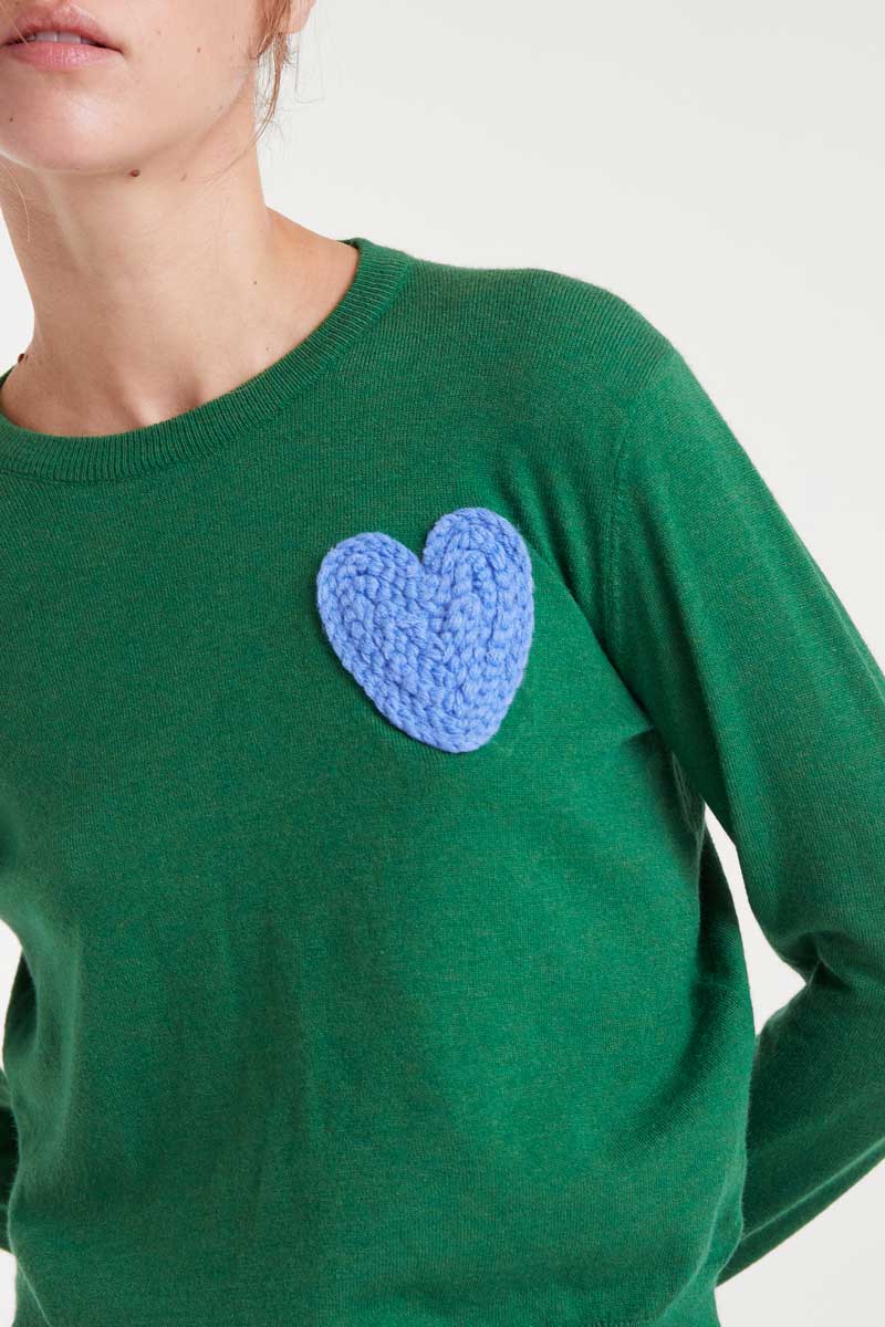 Green knitted sweater with heart print