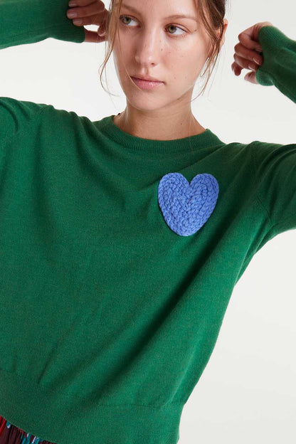 Green knitted sweater with heart print