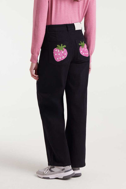 Black jeans with strawberry embroidery