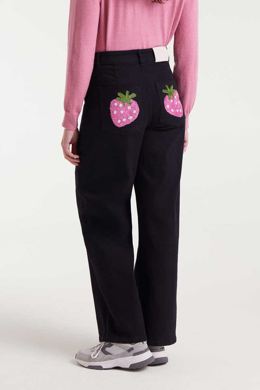 Black jeans with strawberry embroidery