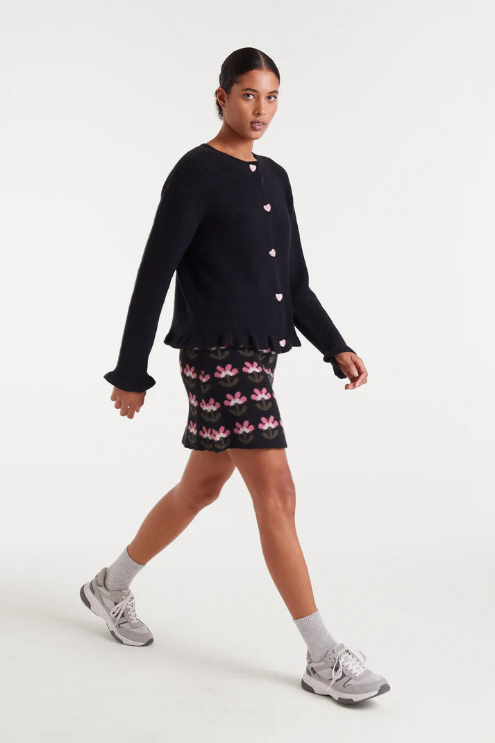 Black knit cardigan with heart detail