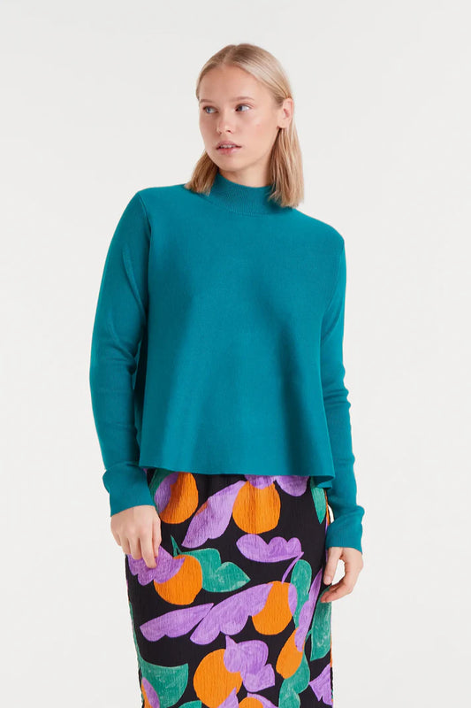 Turquoise flared turtleneck sweater