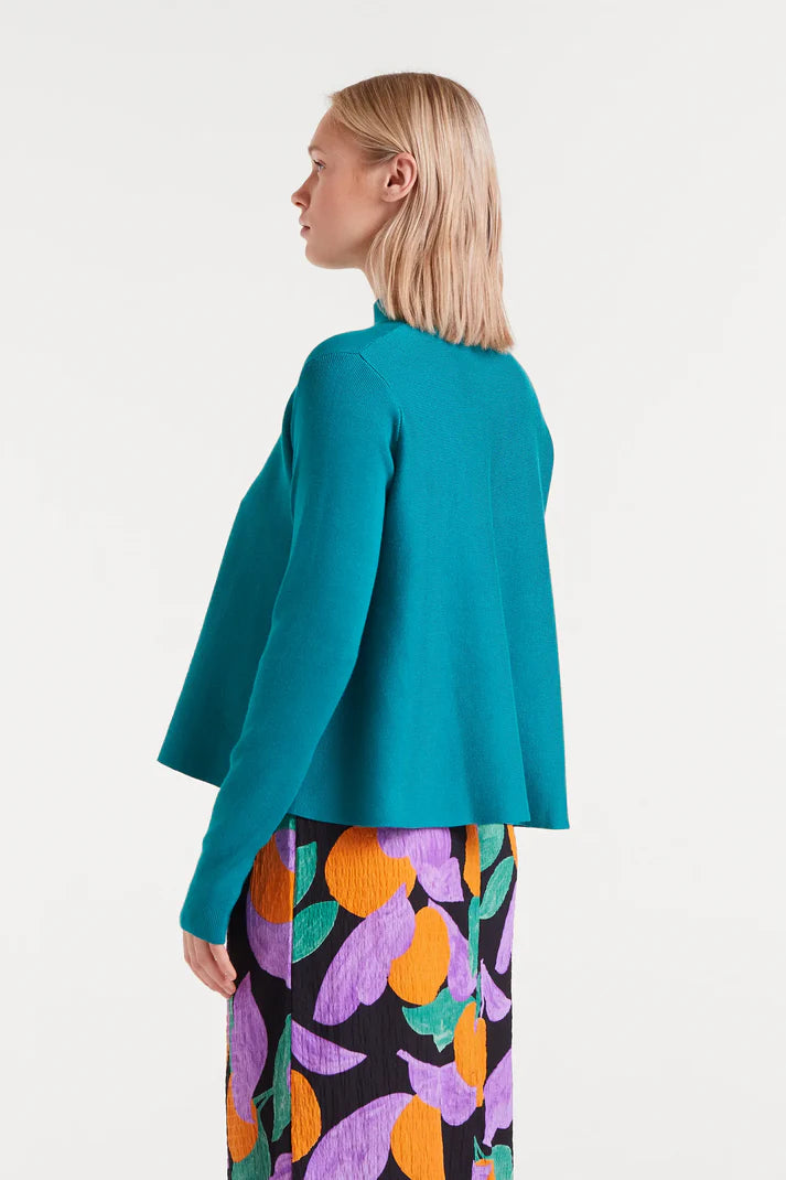 Turquoise flared turtleneck sweater