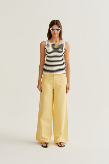 Black and white striped top with banana embroidery