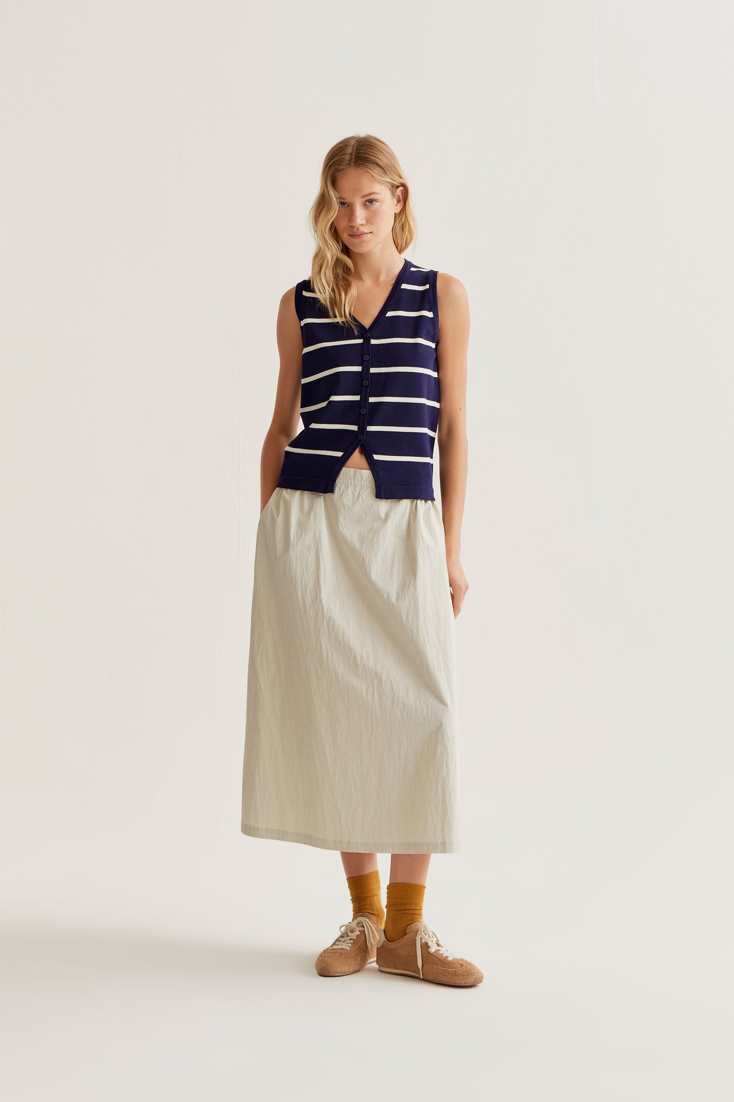 Knitted vest with navy and white striped print