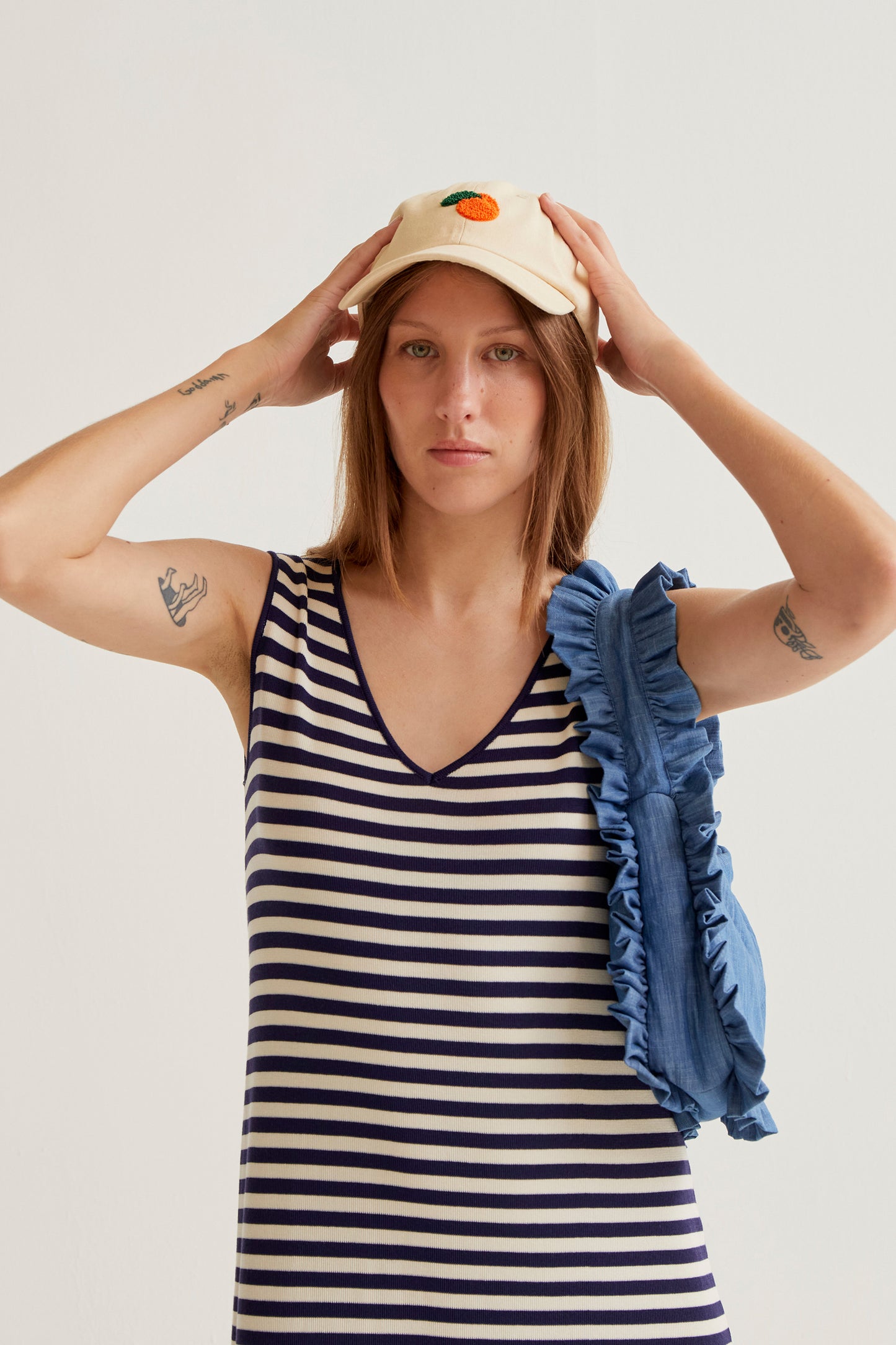 Long knit dress with white and navy striped print