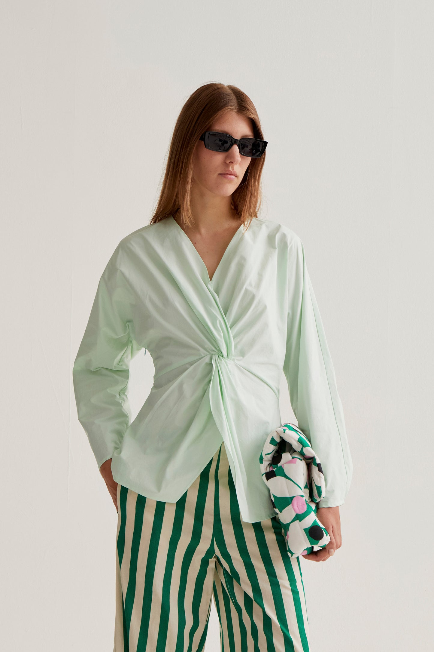 Green draped top