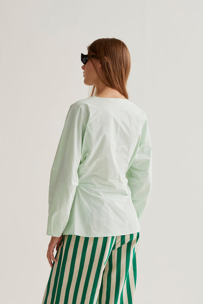 Green draped top