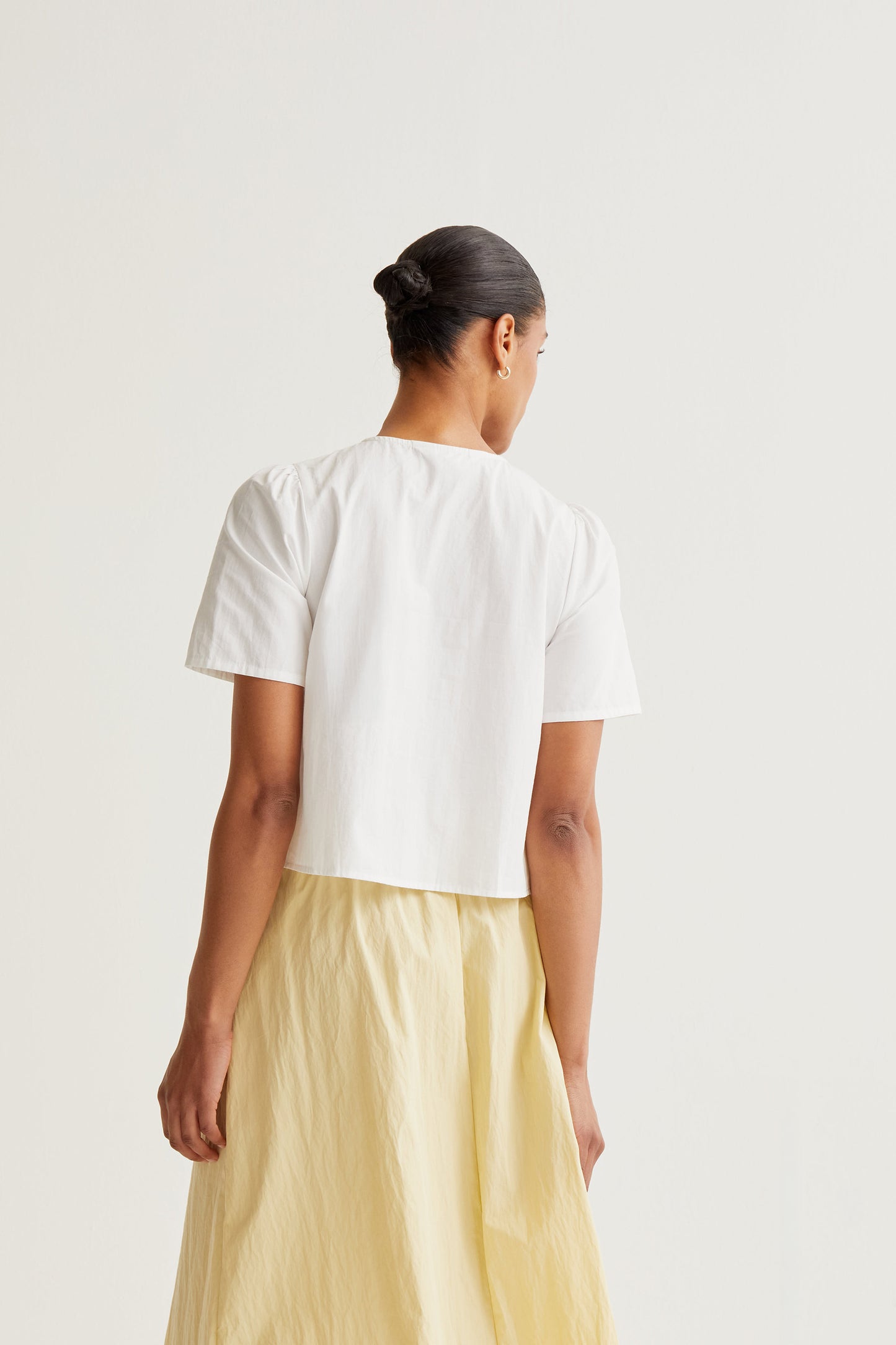 100% cotton top with multicolored buttons
