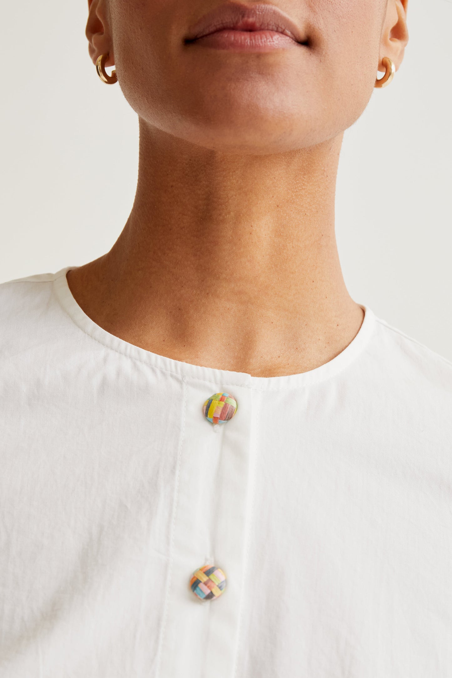 100% cotton top with multicolored buttons