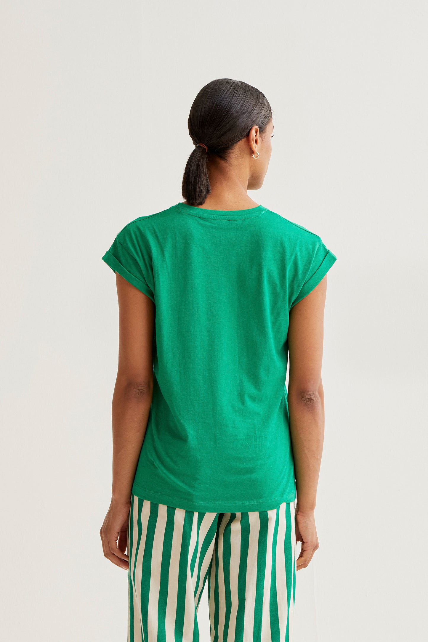Green t-shirt with red tulip embroidery