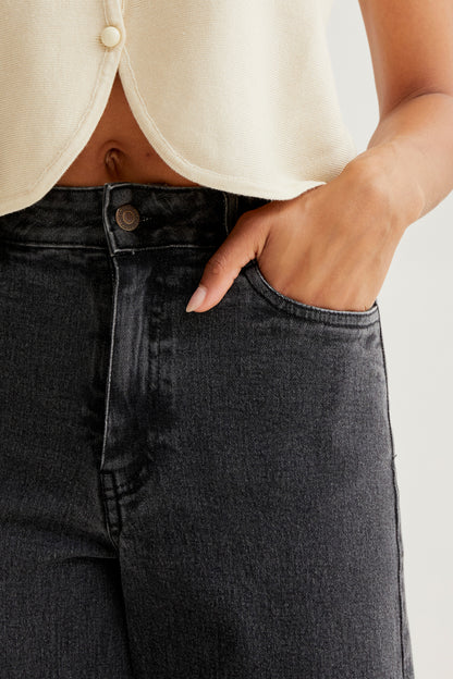 Black jeans with raw-cut hem