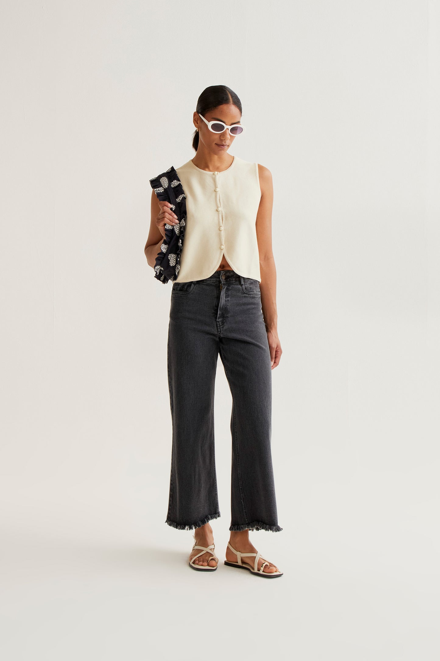 Black jeans with raw-cut hem