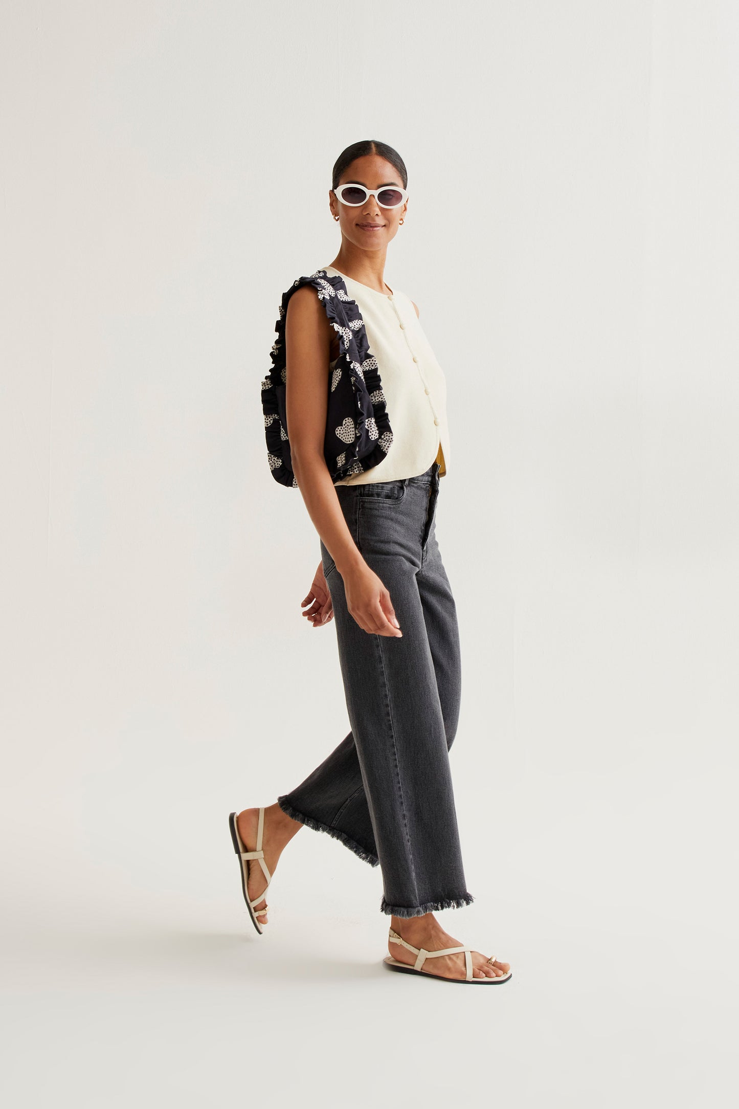 Black jeans with raw-cut hem
