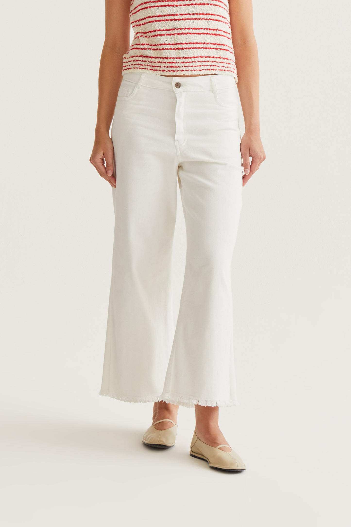 White jeans with raw-cut hem