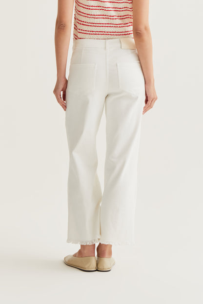 White jeans with raw-cut hem