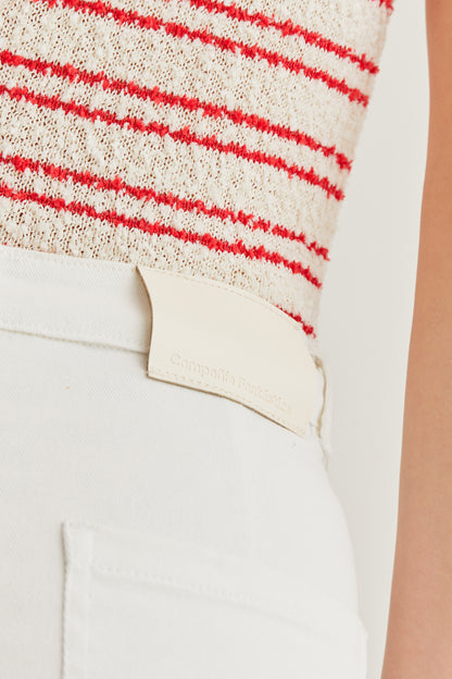 White jeans with raw-cut hem