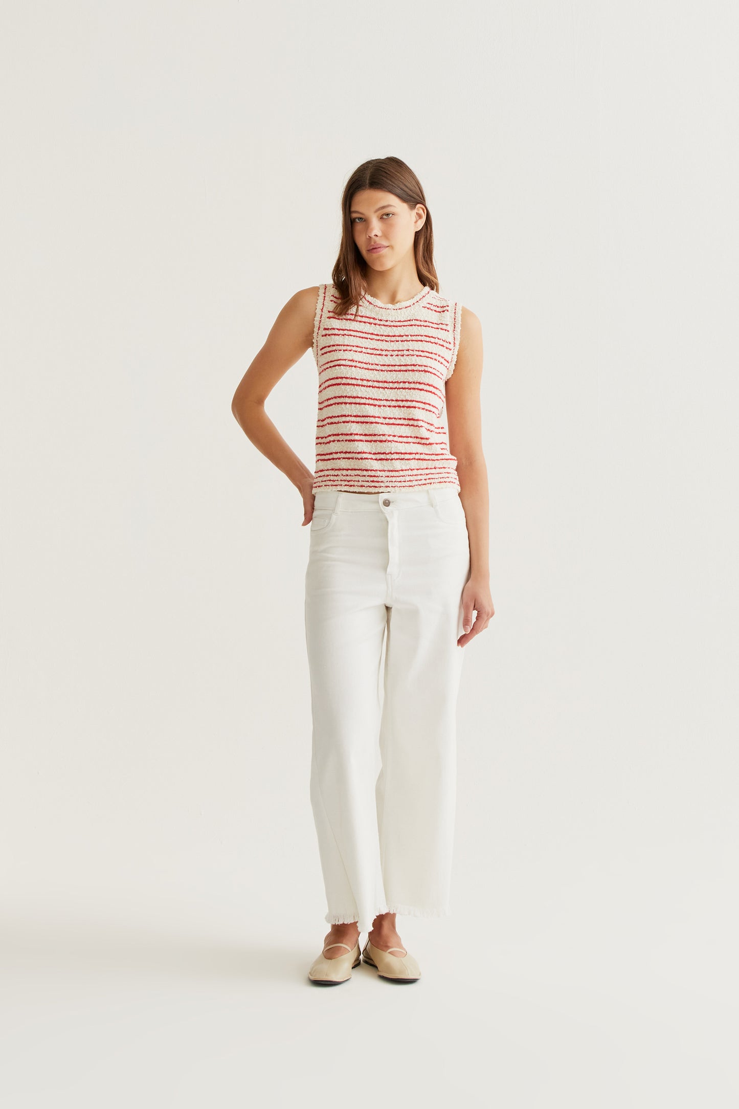 White jeans with raw-cut hem