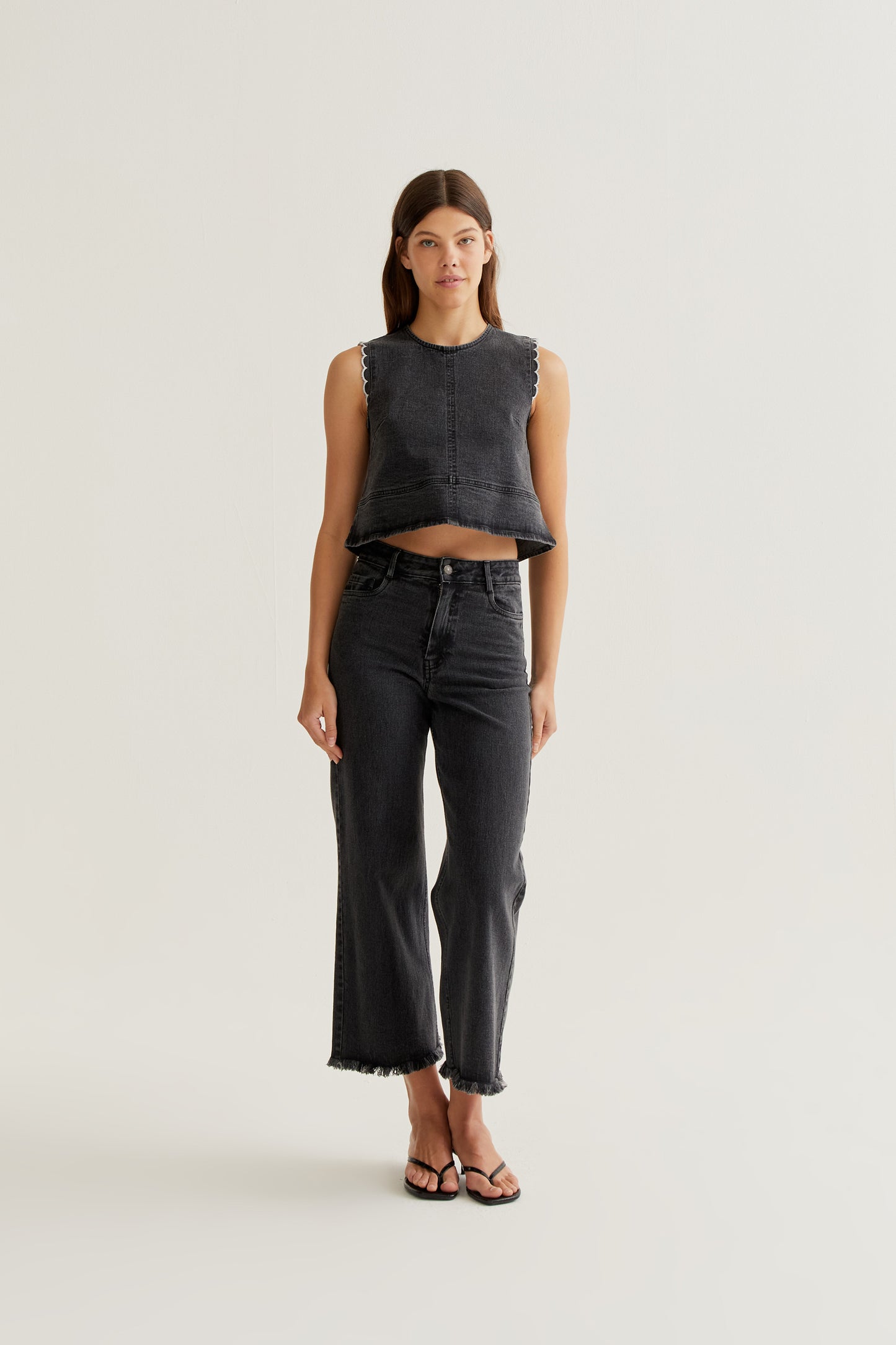 Black denim top with wavy details