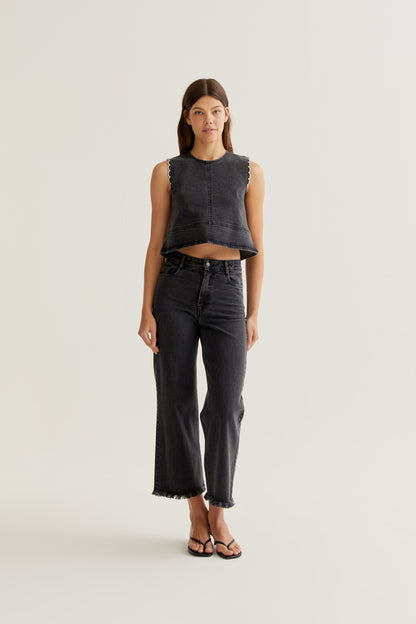 Black denim top with wavy details
