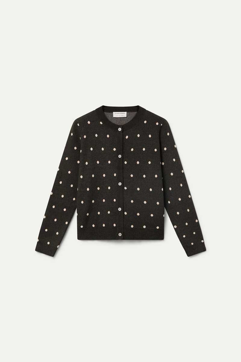 Green cardigan with small white polka dots