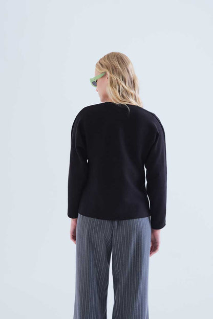 Black cardigan with large buttons