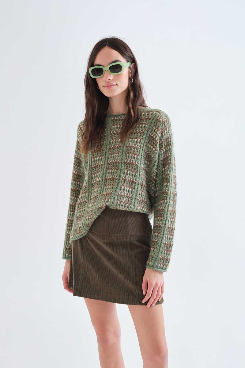 Green knitted jumper with embroidered details