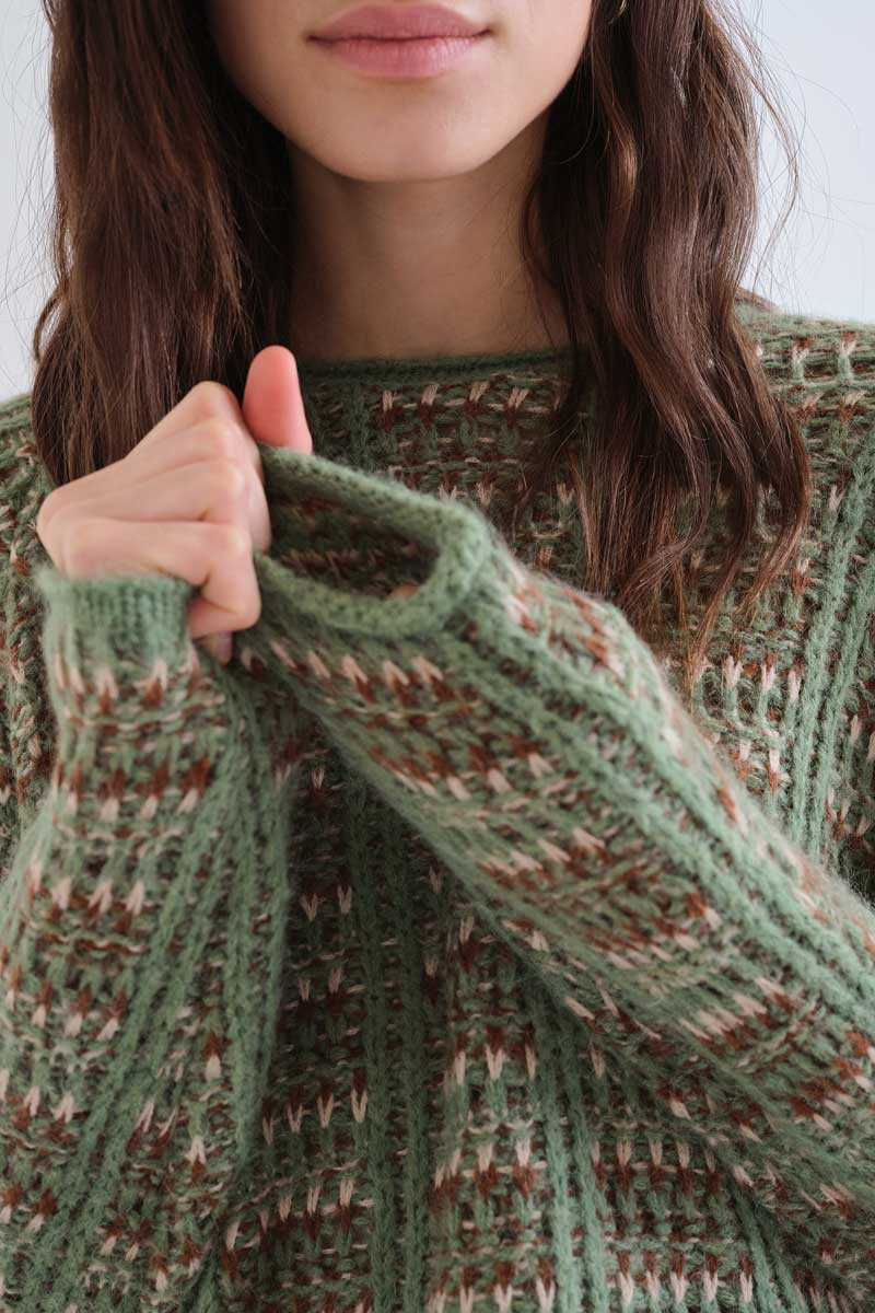 Green knitted jumper with embroidered details