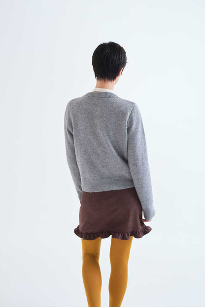 Light grey cardigan with black buttons