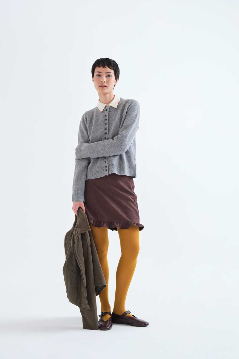 Light grey cardigan with black buttons