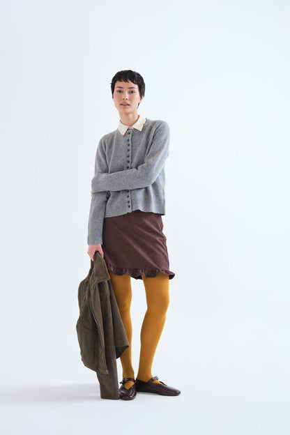 Light grey cardigan with black buttons