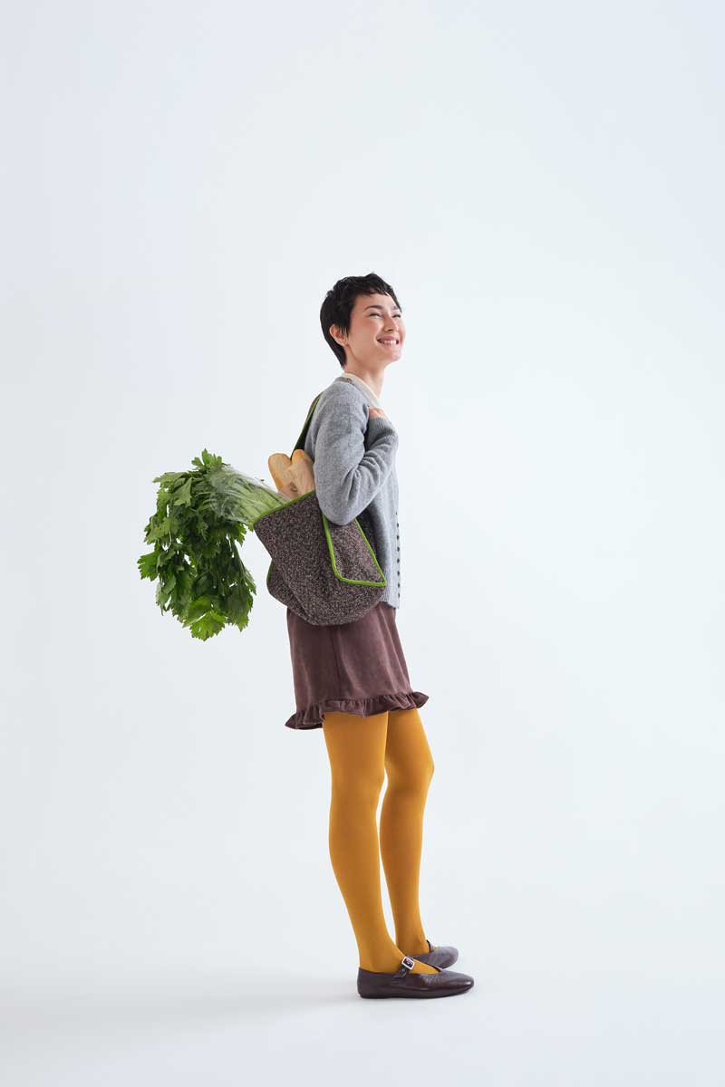 Light grey cardigan with black buttons