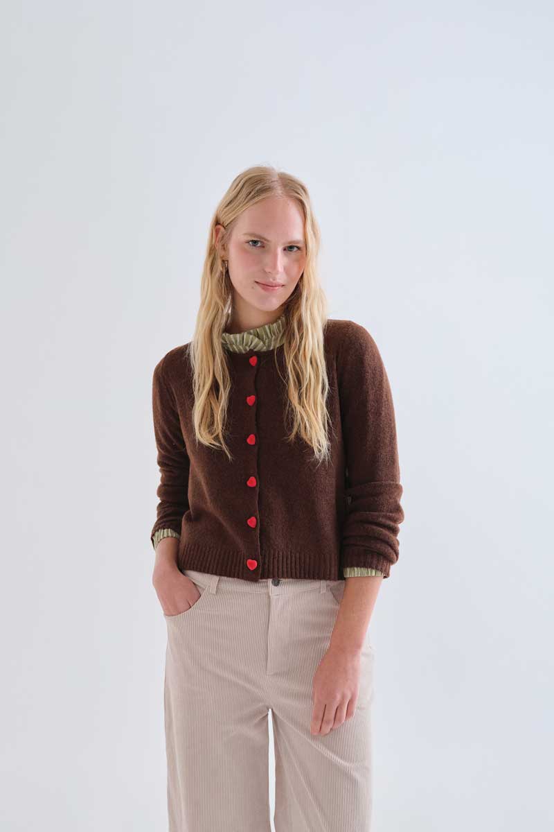 Brown cardigan with red heart buttons