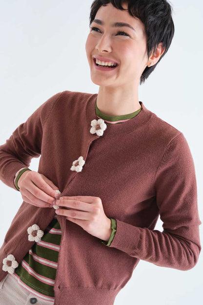 Brown knit cardigan with floral buttons