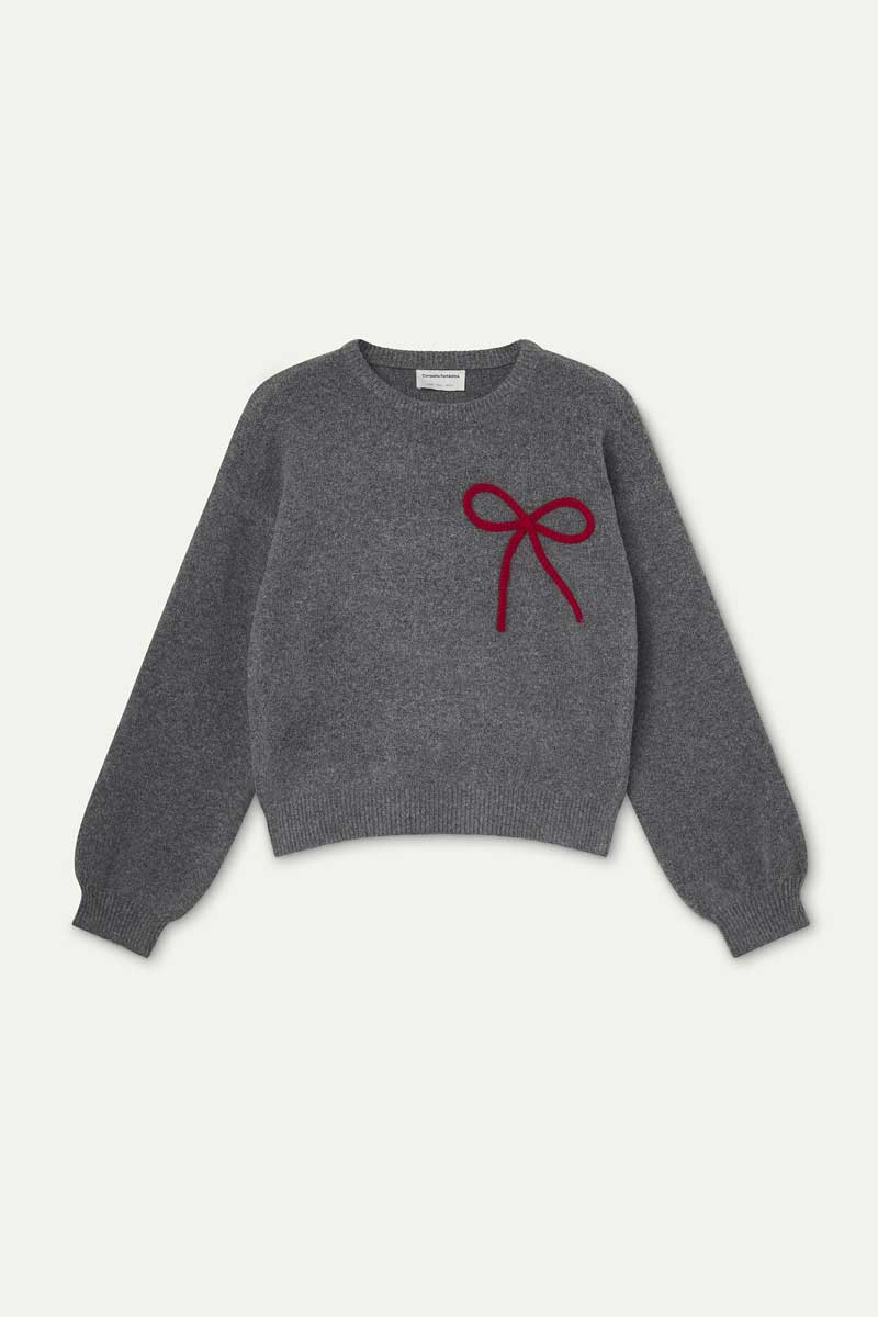 Grey knit jumper with red bow detail