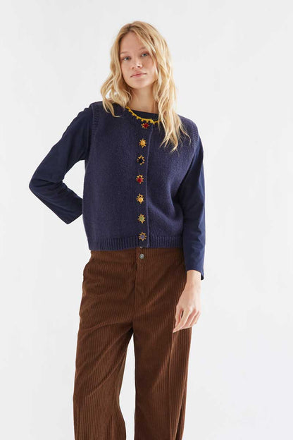 Navy blue knit vest with multicolored velvet buttons