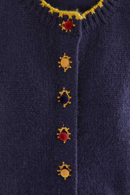 Navy blue knit vest with multicolored velvet buttons