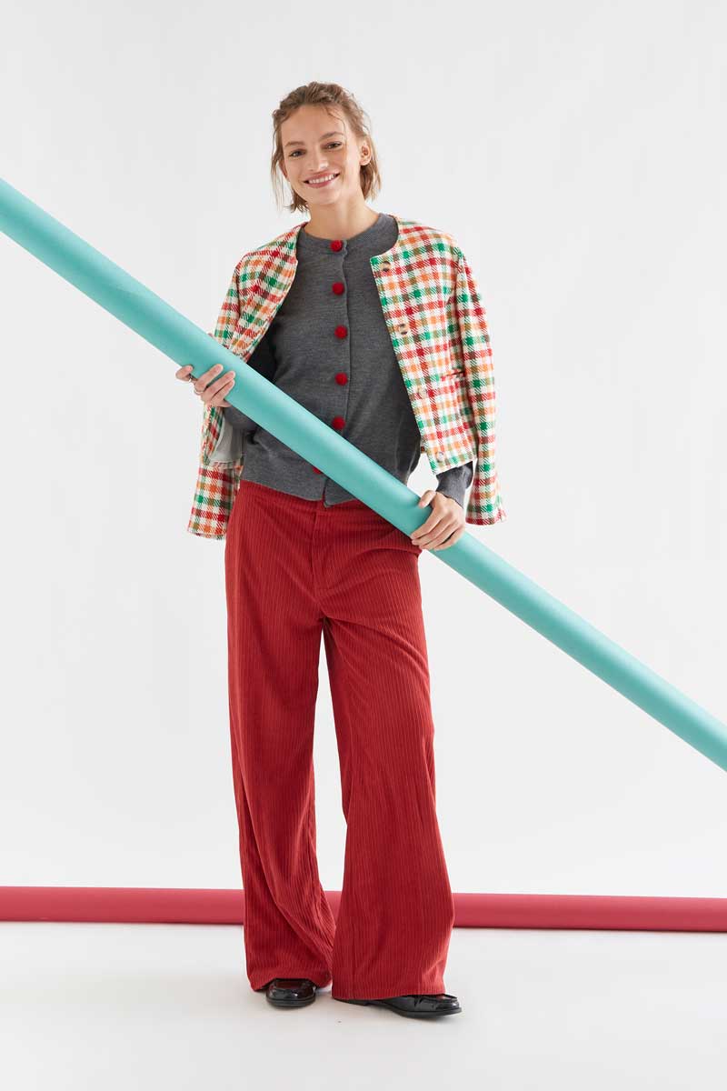 Grey cardigan with red pompoms