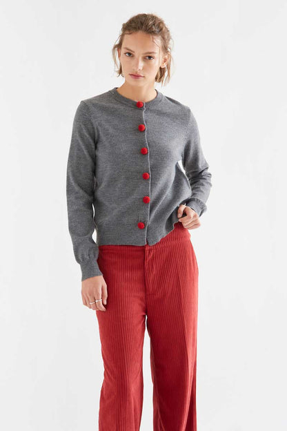 Grey cardigan with red pompoms